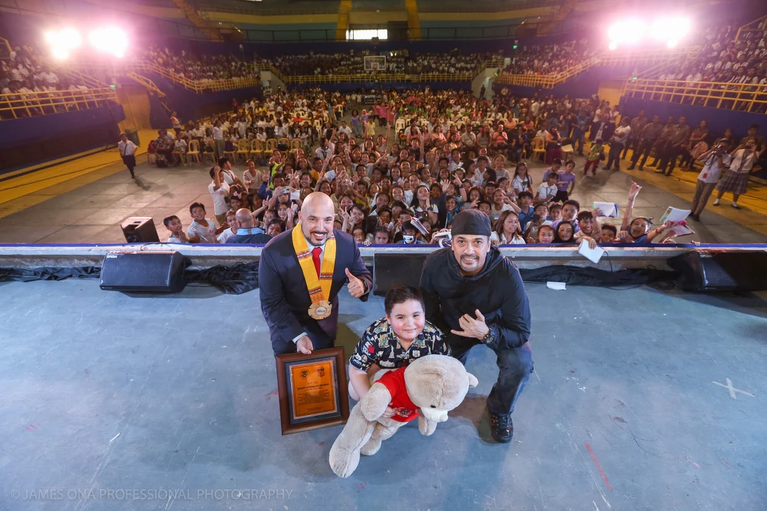 Ricardo Navalta at a community event before an audience