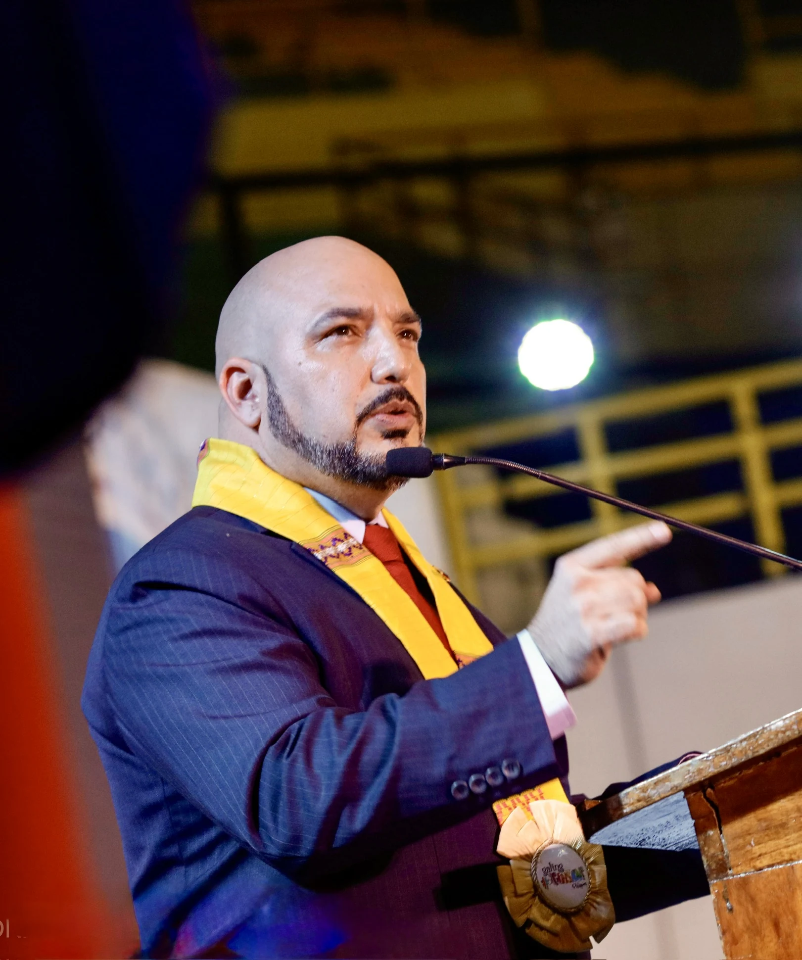 Ricardo Navalta speaking at a lectern
